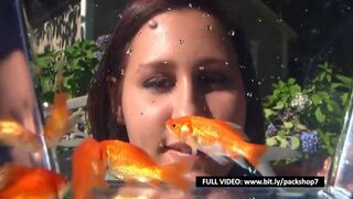 Hungry woman can't resist and devours all her fish - vore giantess